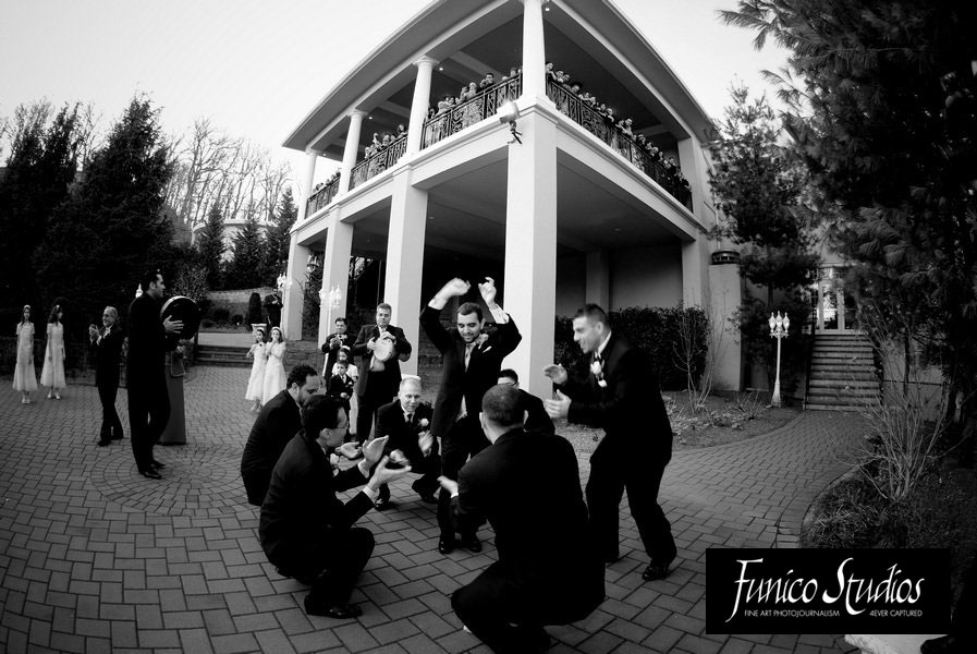 groom at beginning of reception at valley regency wedding