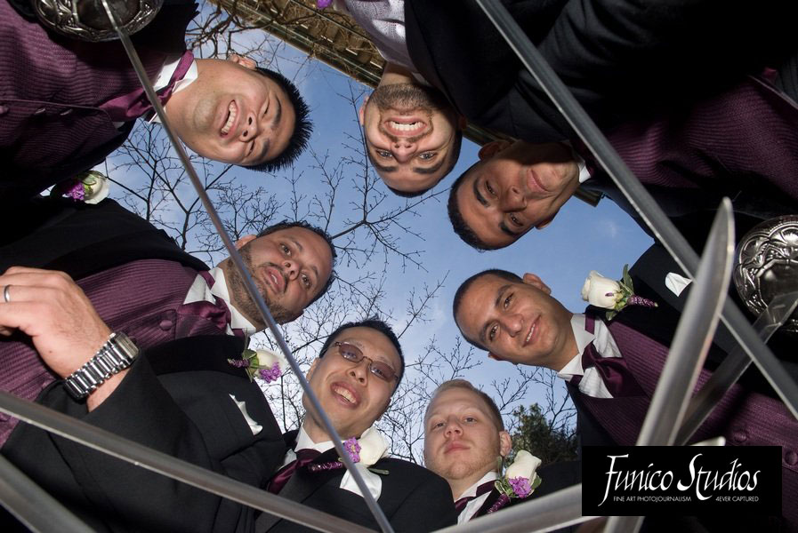 cool groomsmen photo with swords