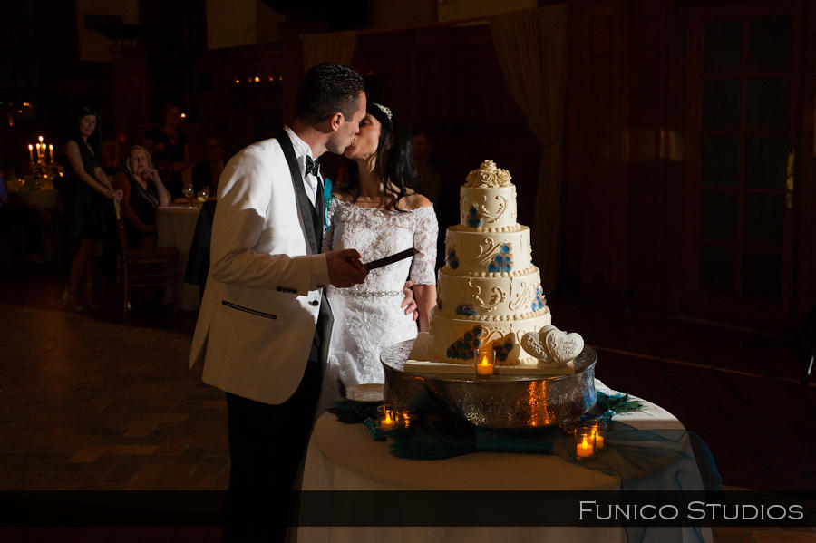 celebrate at snug harbor bride and groom cut cake